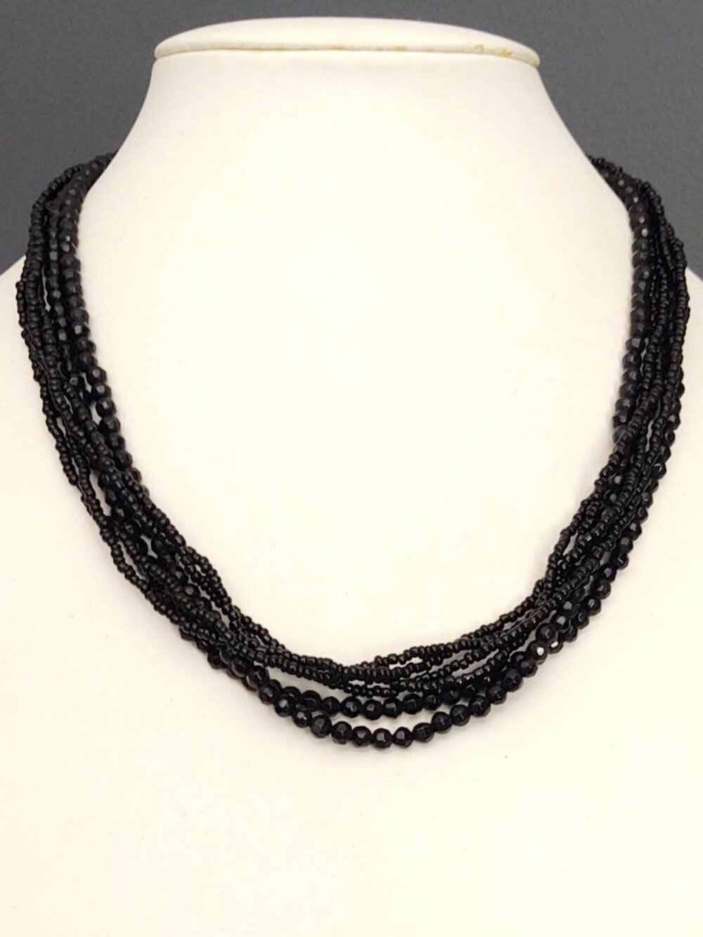 Multi strand black glass and seed bead layered necklace